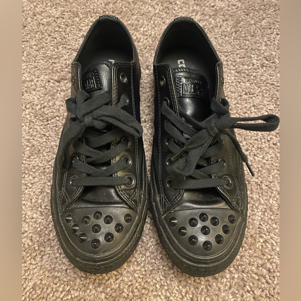 Womens black leather converse chucks with black spikes. Size 8
